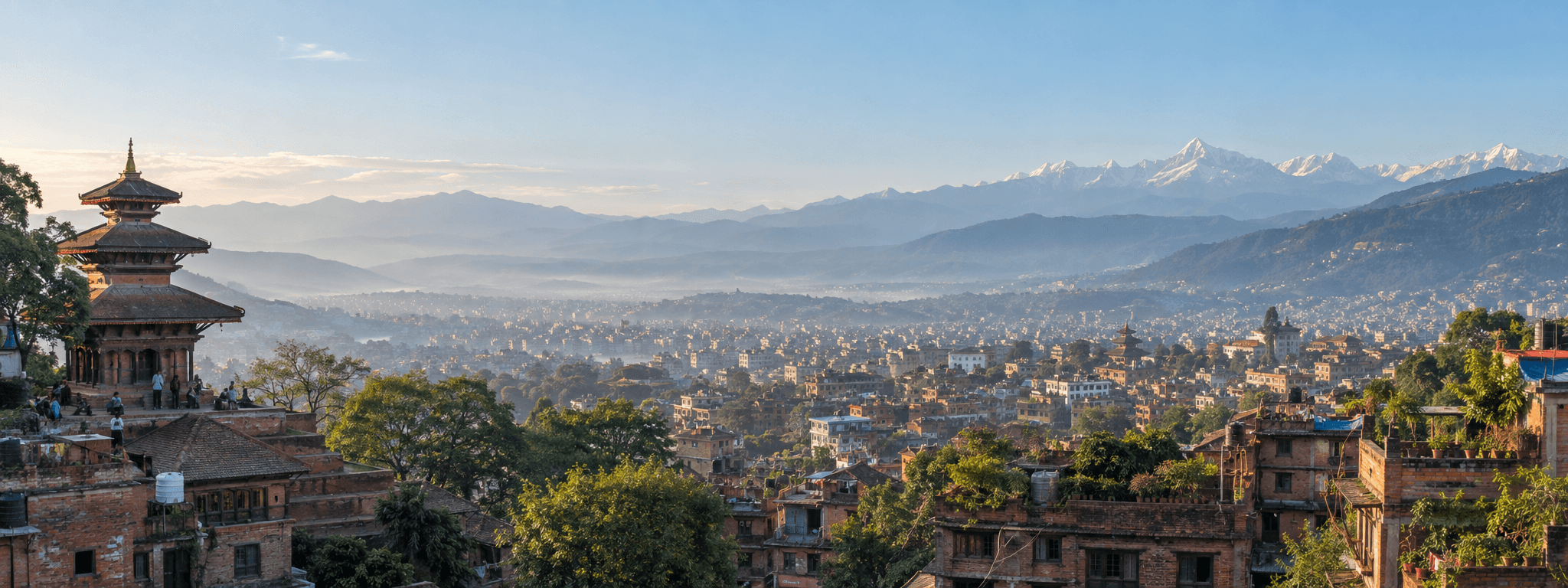 Kathmandu Valley rooftops with a Nepali temple and distant mountains